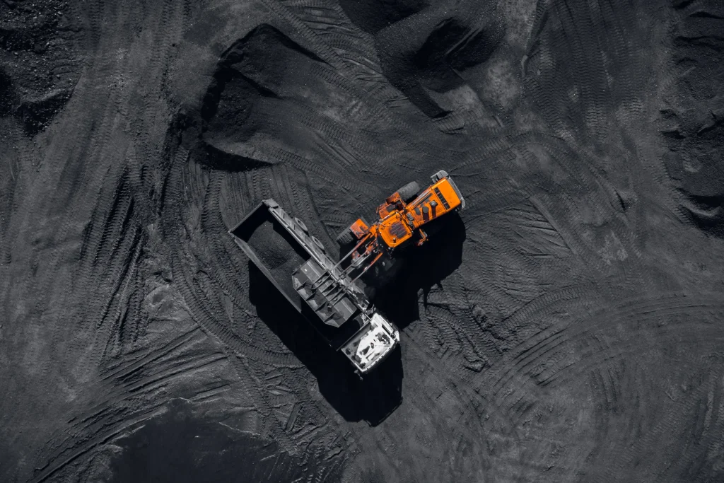 A digger moving coal